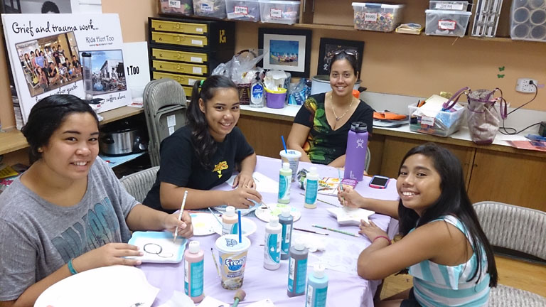 Nikki Gregory (center) and her three daughters meet at Kids Hurt Too Hawaii.
